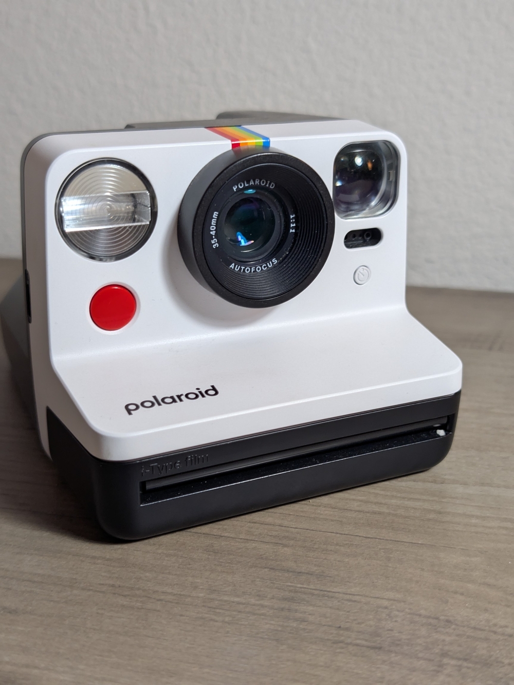 Polaroid White Instant Camera with Rainbow Stripe and Red Shutter